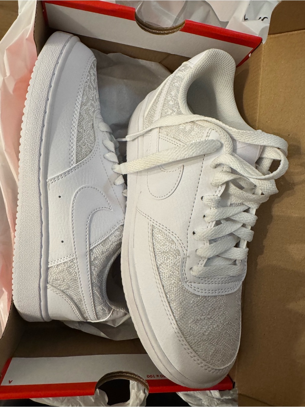 Nike Women’s White Low-Top Sneakers with Lace Texture